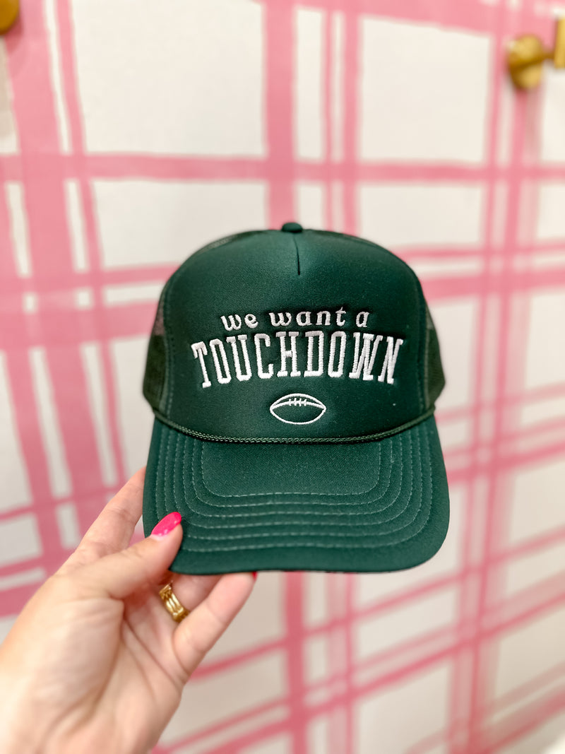 We Want A Touchdown Trucker Hat